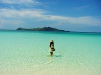 180097-walking-with-the-fishes-in-amanpulo-palawan-philippines.jpg